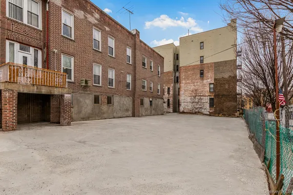a view of a building with a street