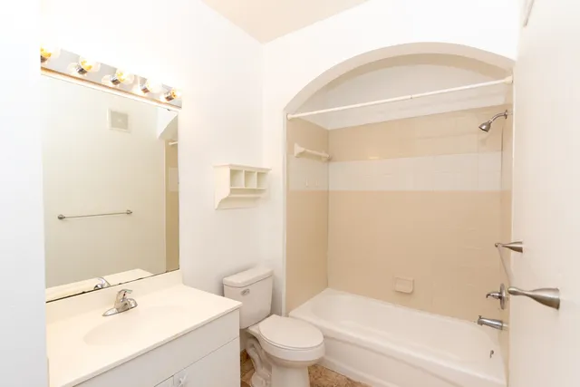 a view of a glass door and a yard from a window