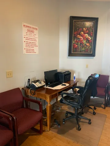 a view of a lake with houses in the back