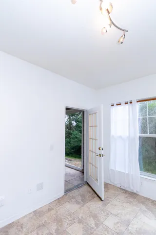 an empty room with windows