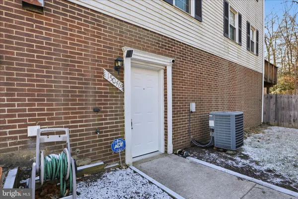 a view of a brick house with a door