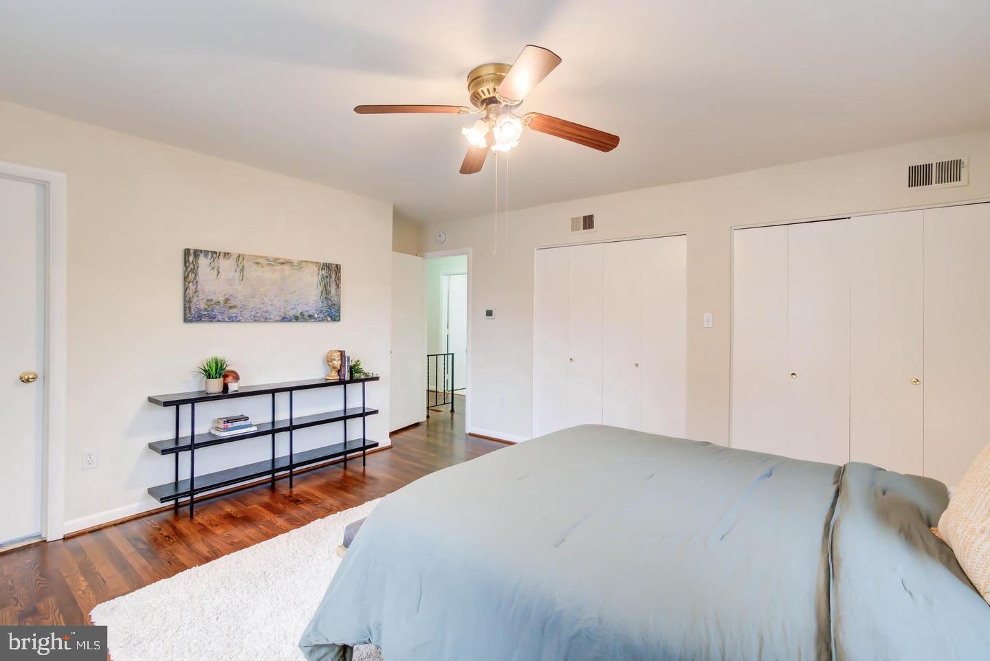11207 Emack Road Beltsville, MD 20705 - Photo 18 of 43 Spacious bedroom with modern charm.