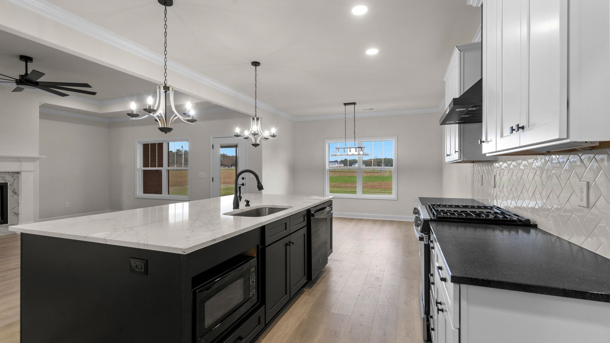 56 Old Quick Road Fayetteville, TN 37334 - Photo 11 of 32 a kitchen with granite countertop a sink a counter top space appliances and cabinets