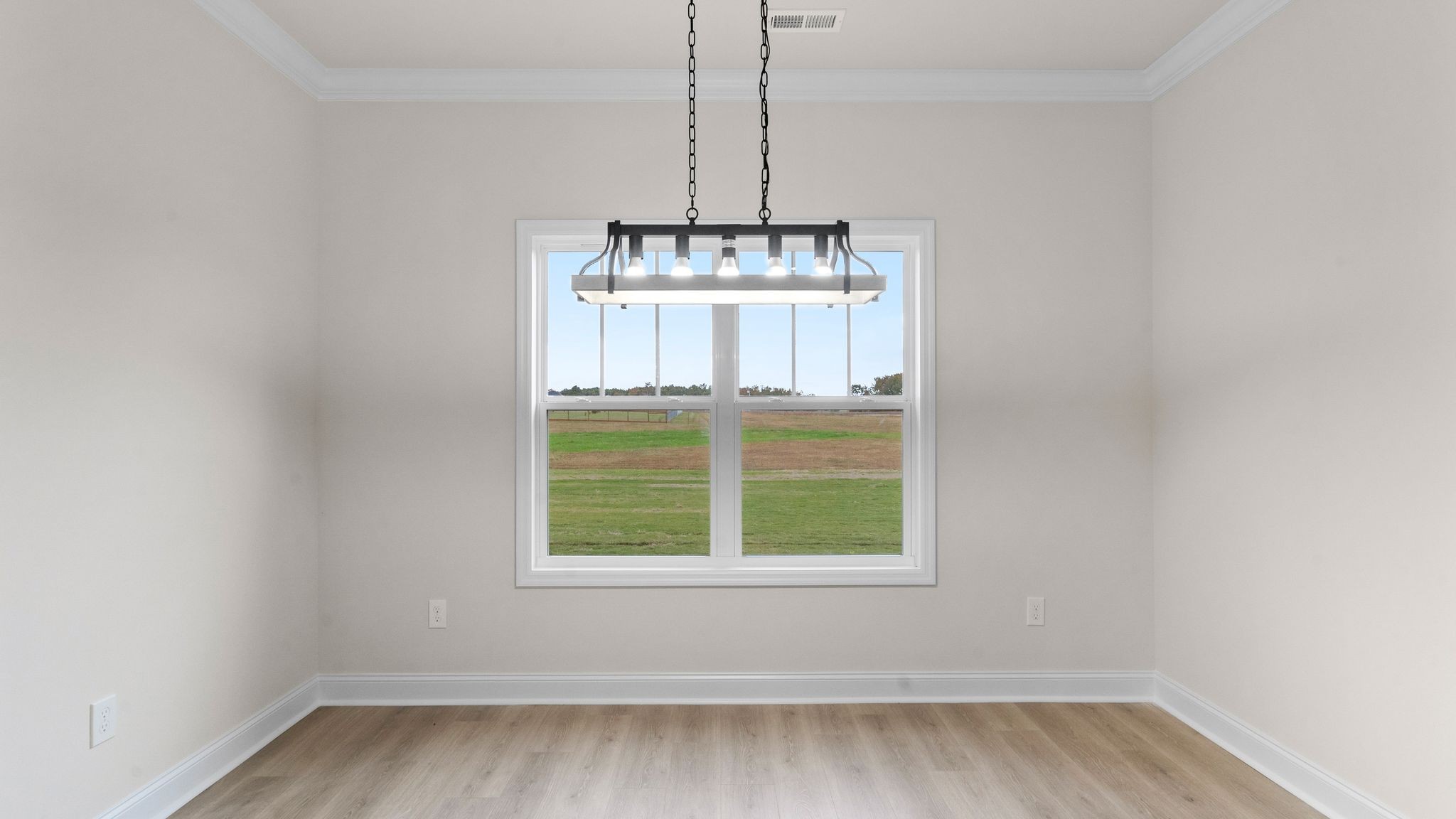 56 Old Quick Road Fayetteville, TN 37334 - Photo 12 of 32 a view of a room with a window and wooden floor