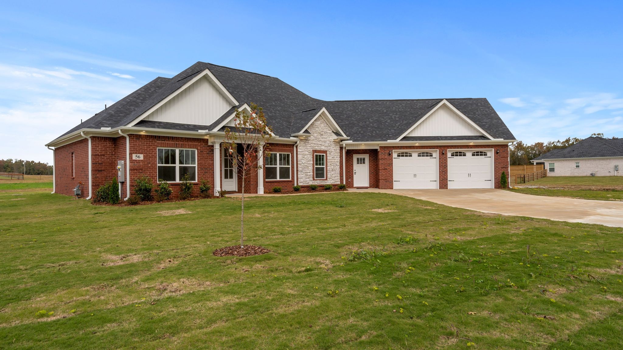 56 Old Quick Road Fayetteville, TN 37334 - Photo 2 of 32 a front view of a house with a garden and porch