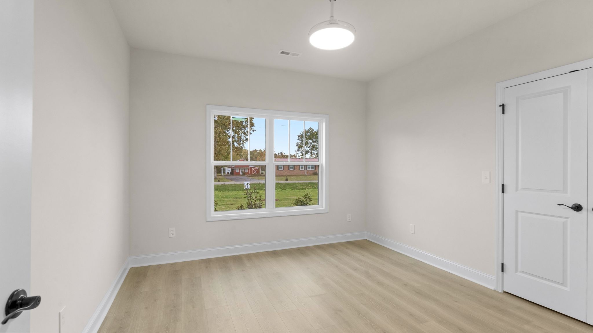 56 Old Quick Road Fayetteville, TN 37334 - Photo 21 of 32 an empty room with a window