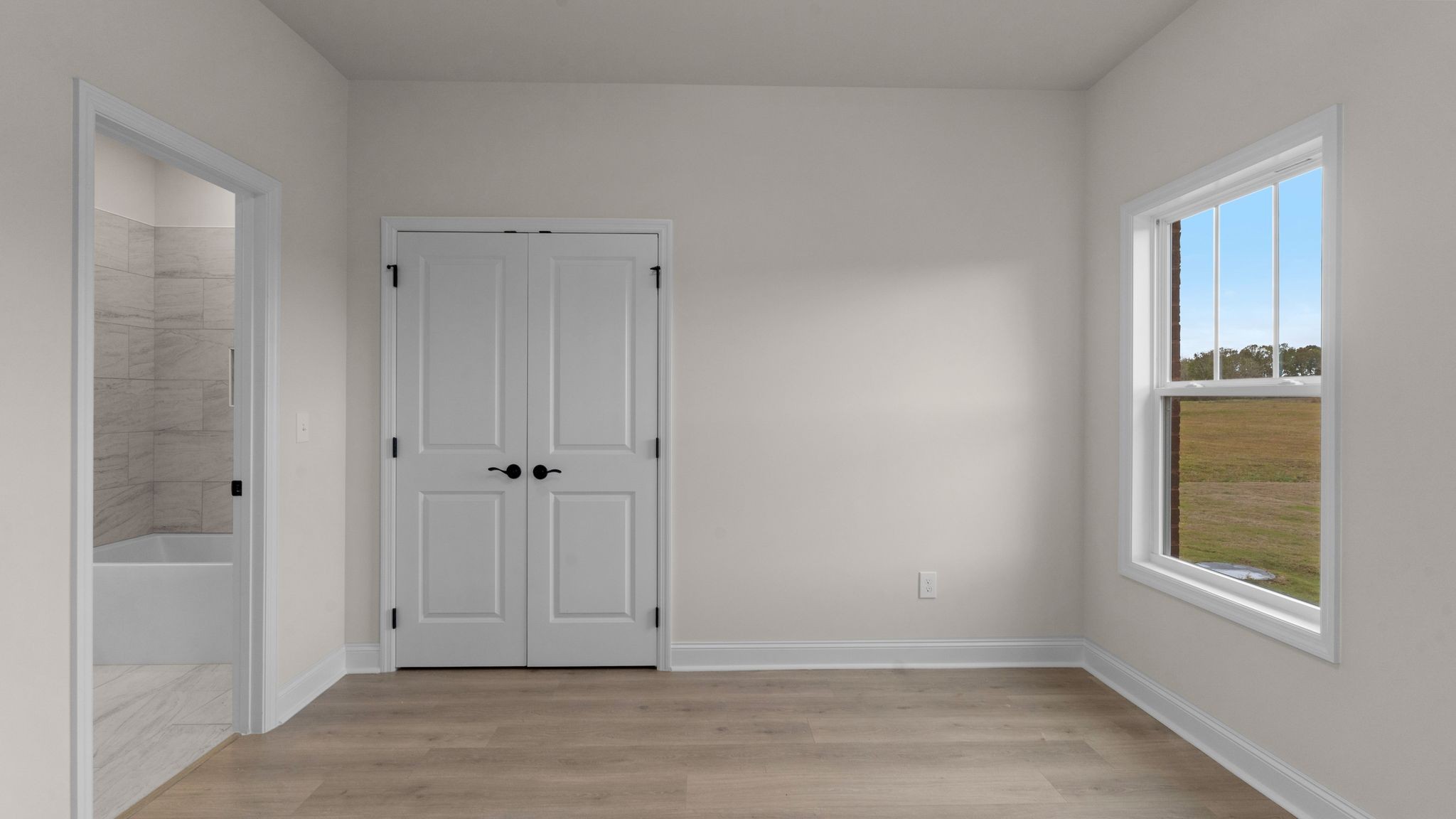 56 Old Quick Road Fayetteville, TN 37334 - Photo 25 of 32 a view of an empty room with window and closet area