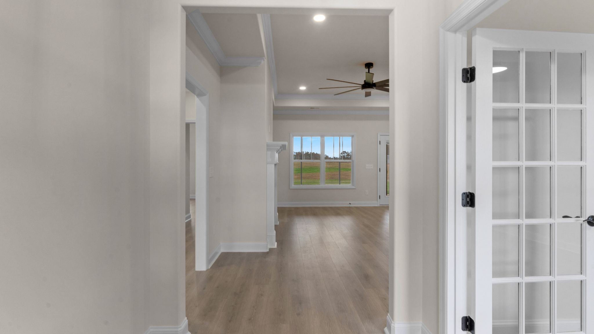 56 Old Quick Road Fayetteville, TN 37334 - Photo 4 of 32 a view of a hallway with wooden floor and a bathroom