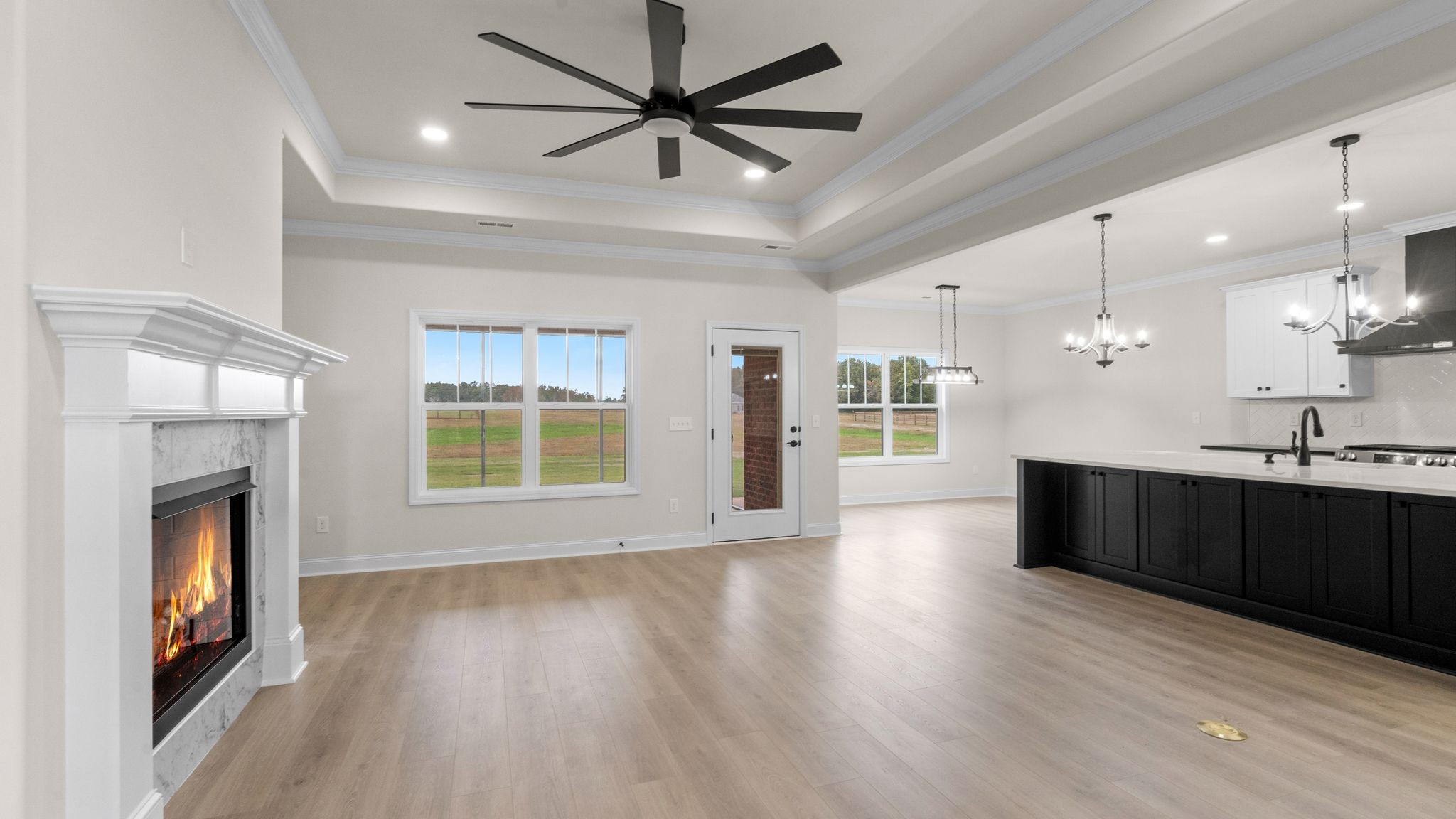 56 Old Quick Road Fayetteville, TN 37334 - Photo 7 of 32 a view of an empty room with a fireplace and a window