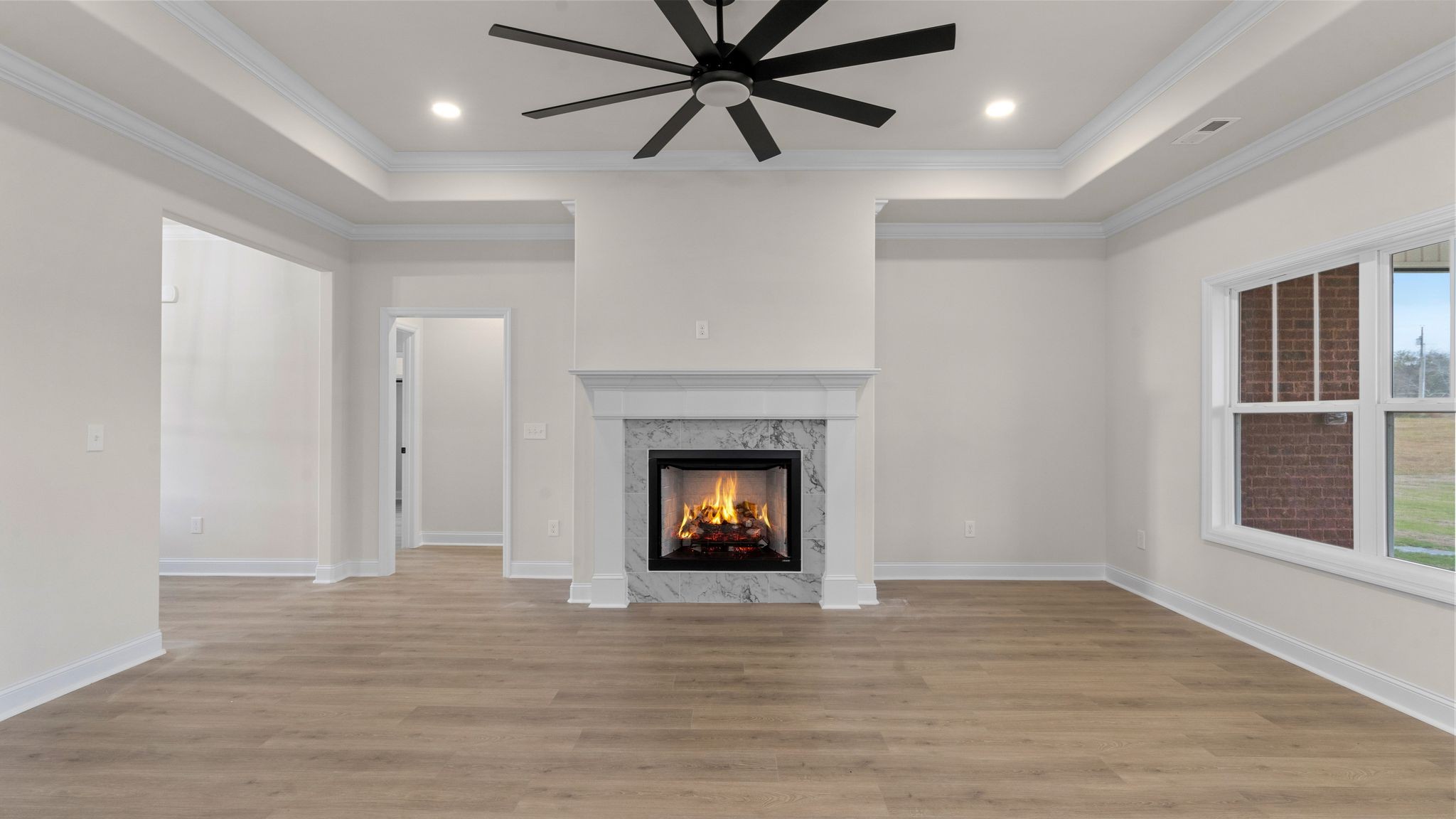 56 Old Quick Road Fayetteville, TN 37334 - Photo 8 of 32 a view of an empty room with window and fire place
