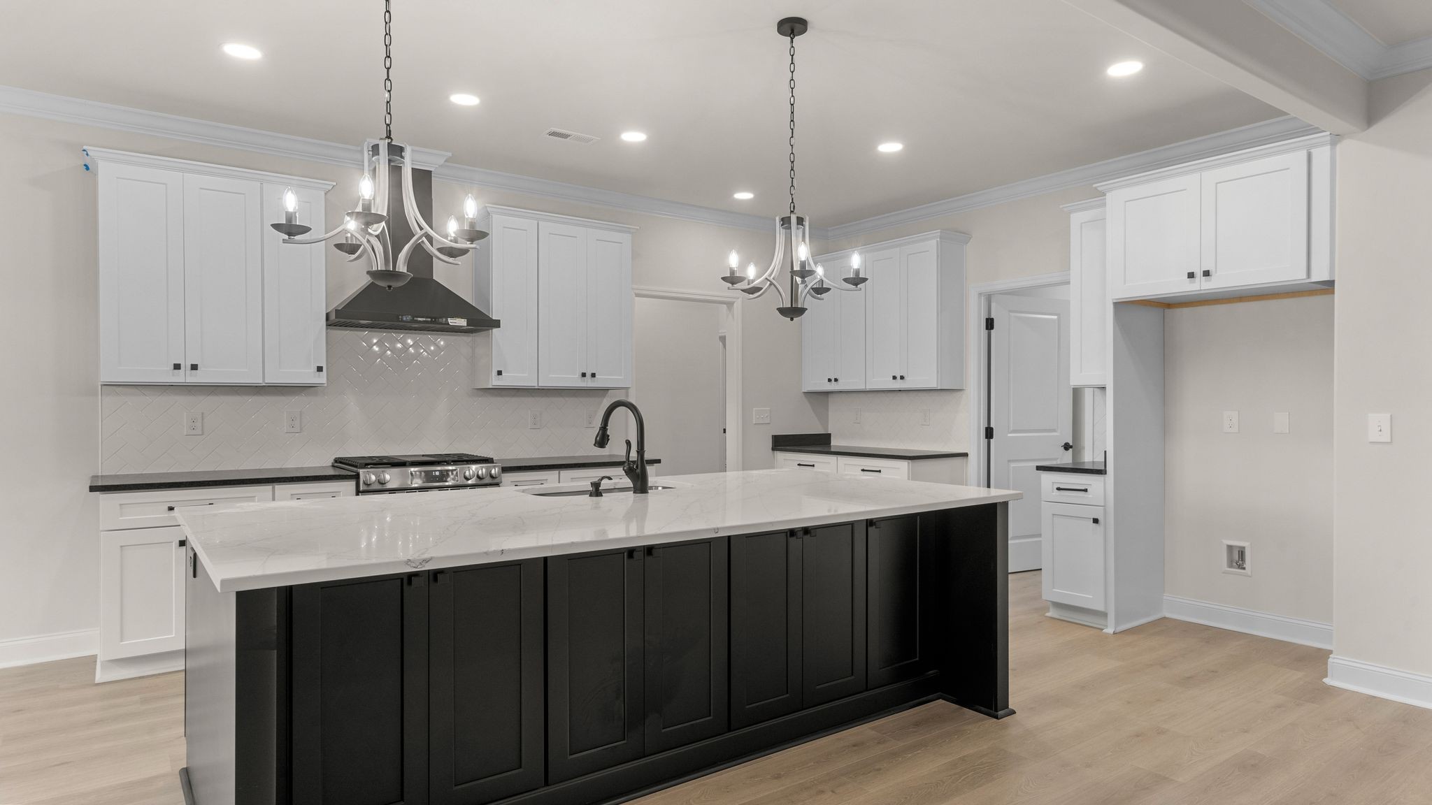 56 Old Quick Road Fayetteville, TN 37334 - Photo 9 of 32 a kitchen with a sink chandelier and refrigerator