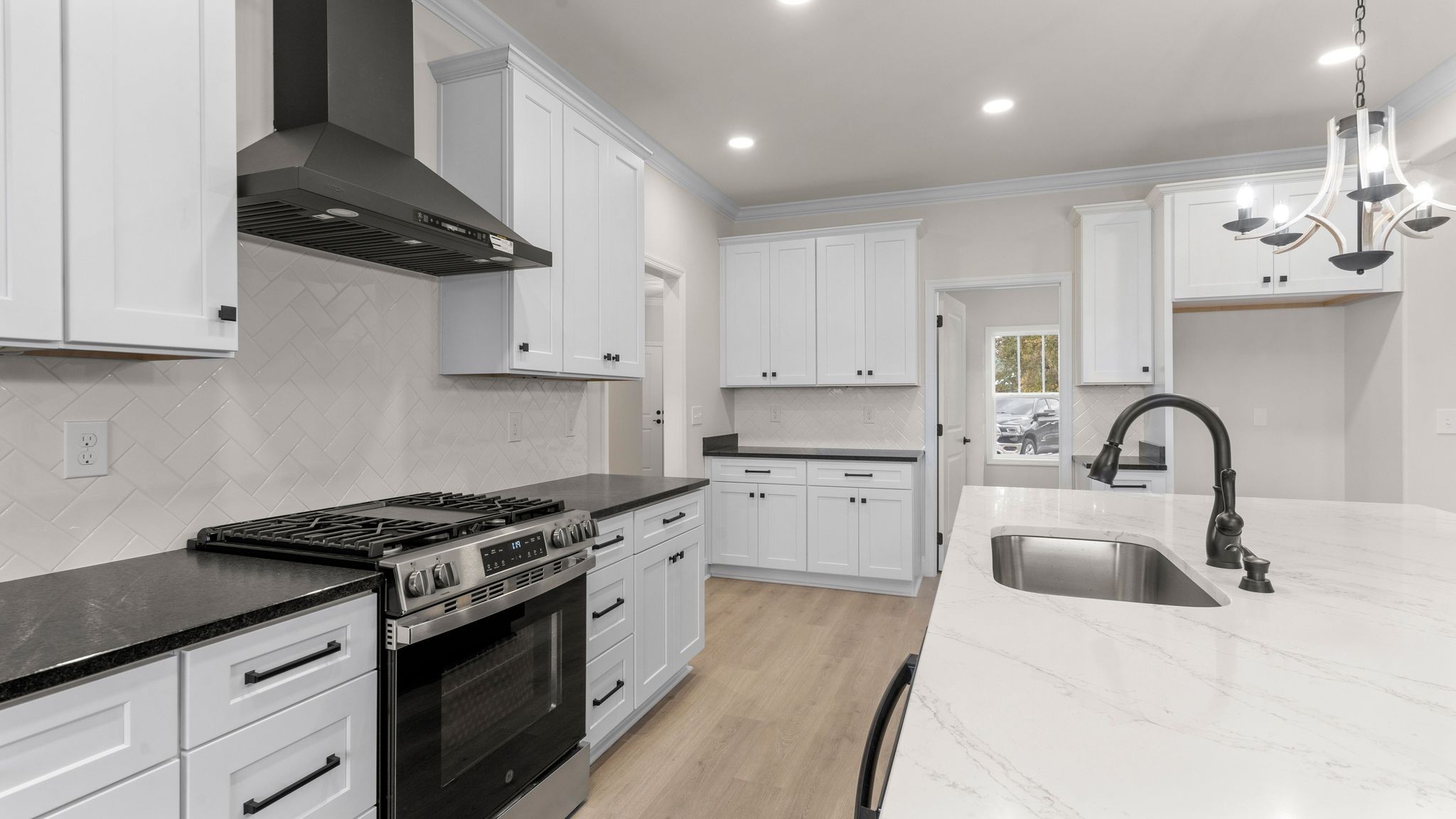 56 Old Quick Road Fayetteville, TN 37334 - Photo 10 of 32 a kitchen with granite countertop a sink stainless steel appliances and cabinets