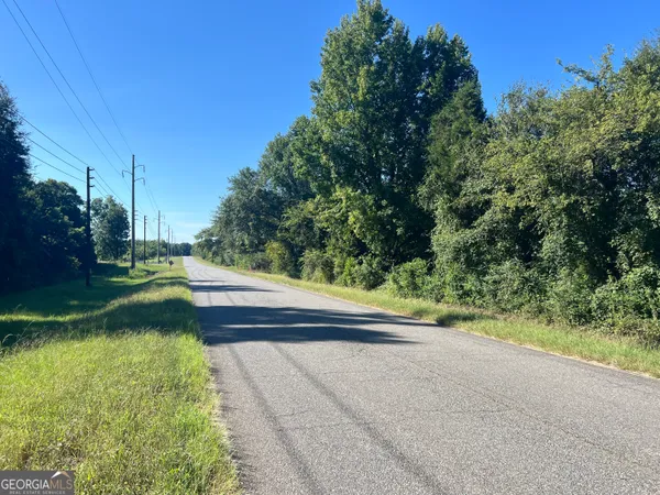 a view of swimming pool outdoor space and garden