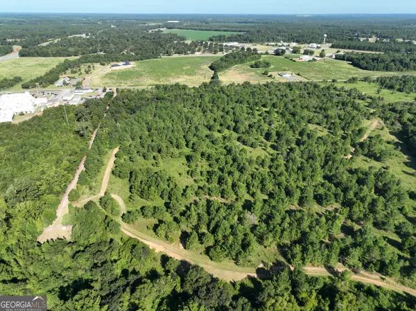 a view of a city with a lake