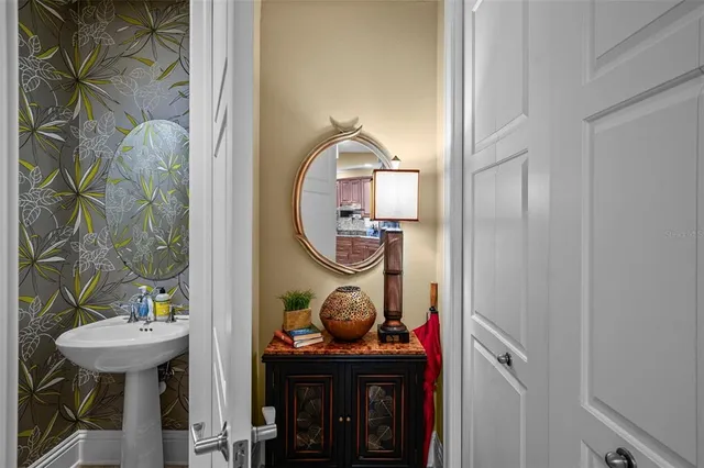 a bathroom with a sink and a mirror