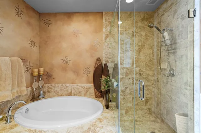 a bathroom with a sink and shower