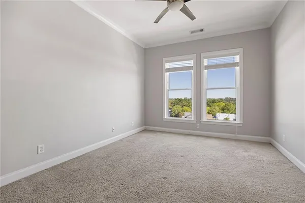 a bathroom with a toilet a sink and a mirror