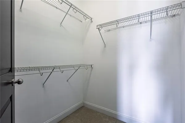 a front view of a house with outdoor seating