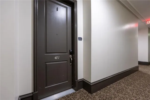 a view of a elevator and a mirror