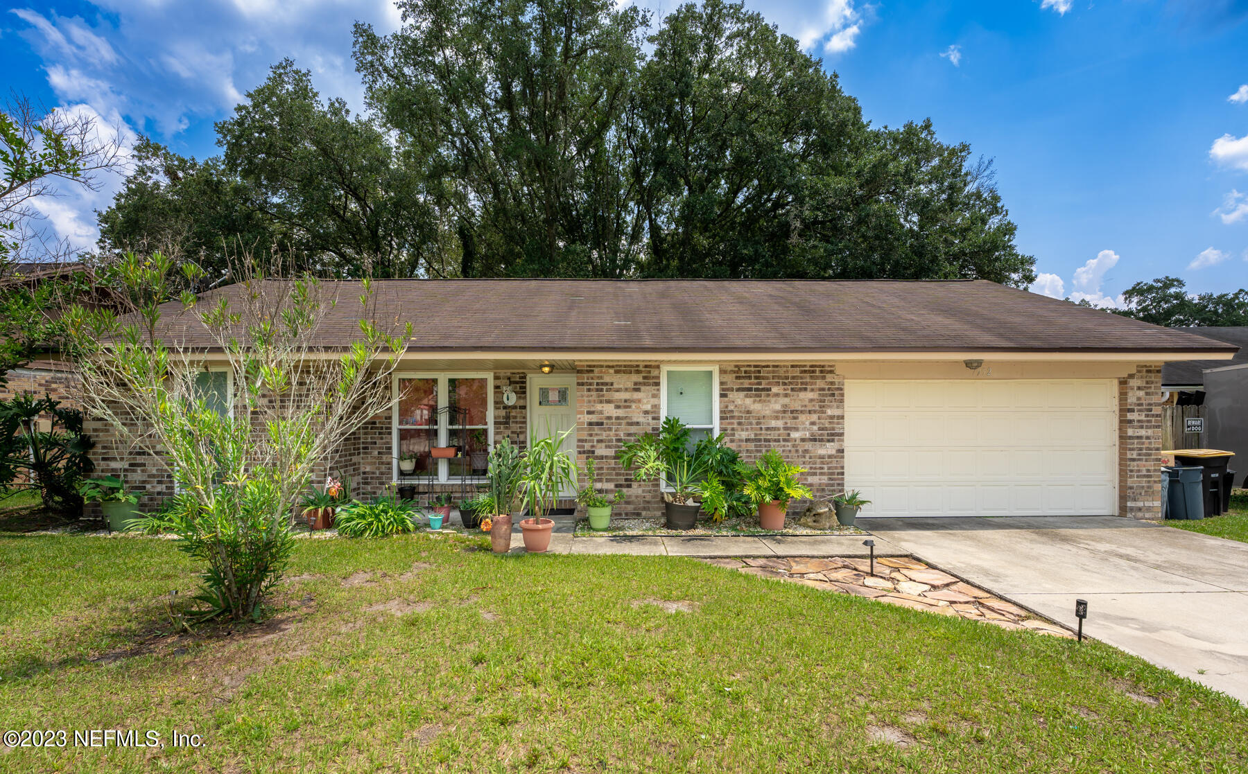 7952 Gulf Road South Jacksonville, FL 32244 - Photo 1 of 14 a view of a house with a garden