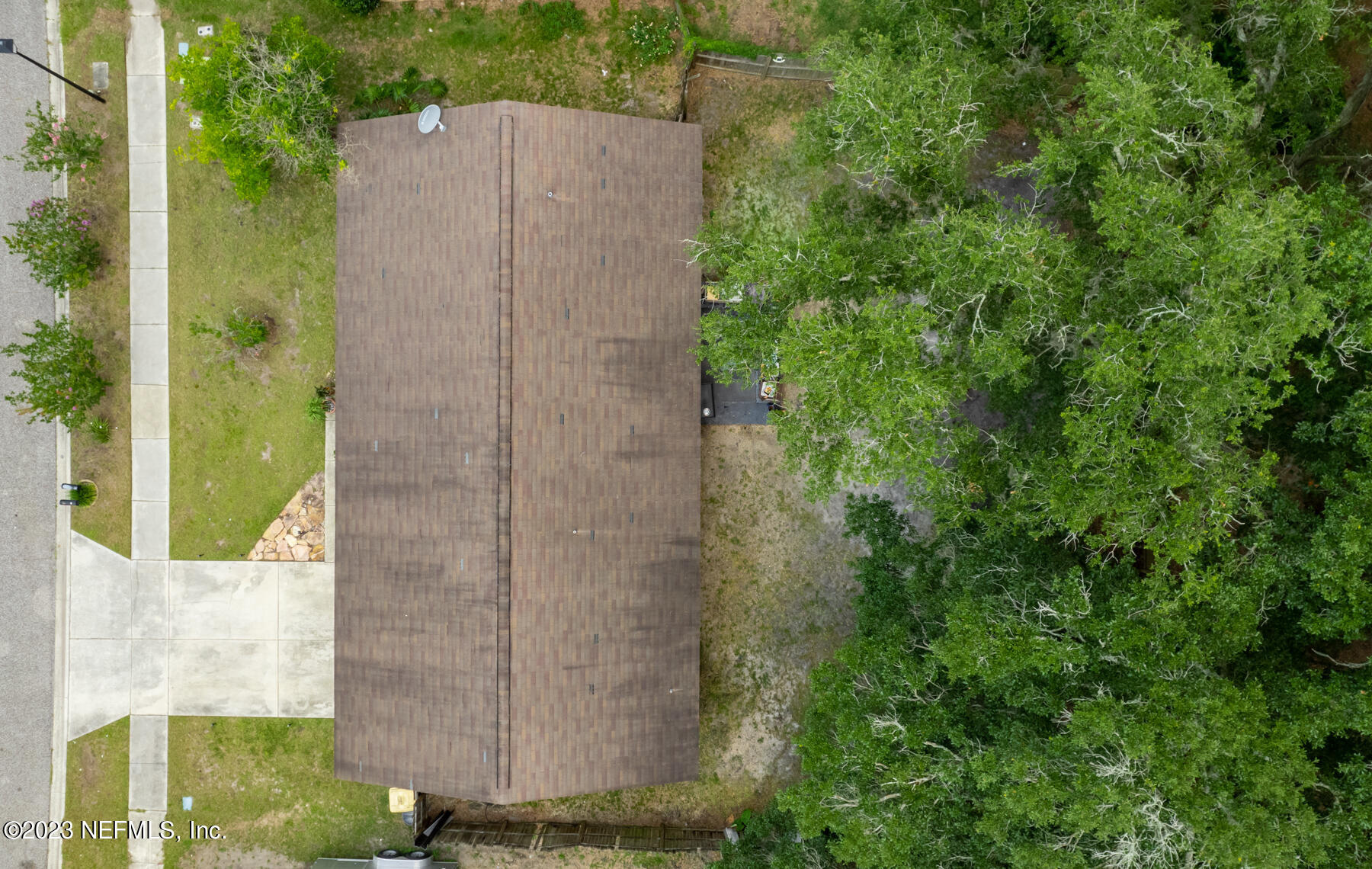 7952 Gulf Road South Jacksonville, FL 32244 - Photo 13 of 14 an aerial view of a large building with trees in the background