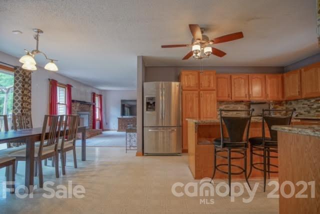 9675 Mt Olive Road Mount Pleasant, NC 28124 - Photo 17 of 48 a view of a dining room with furniture window and outside view