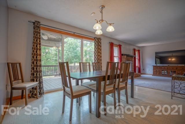 9675 Mt Olive Road Mount Pleasant, NC 28124 - Photo 18 of 48 a view of a dining room with furniture window and outside view