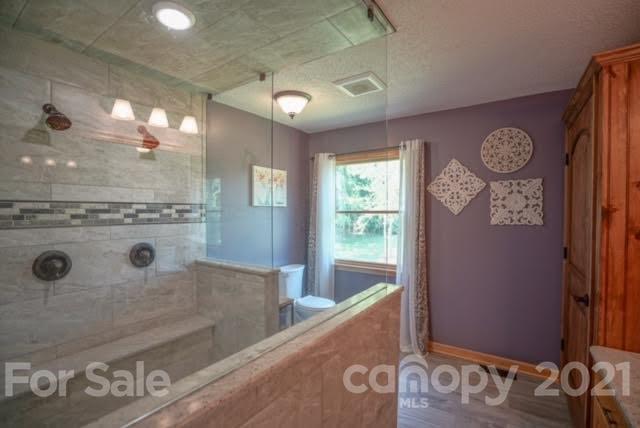 9675 Mt Olive Road Mount Pleasant, NC 28124 - Photo 33 of 48 a view of a storage & utility room with a window