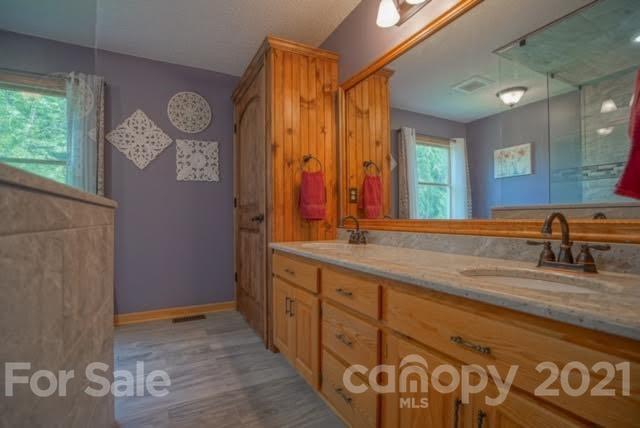 9675 Mt Olive Road Mount Pleasant, NC 28124 - Photo 35 of 48 a bathroom with sinks mirror and vanity