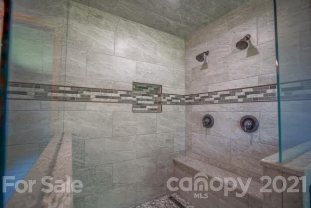 9675 Mt Olive Road Mount Pleasant, NC 28124 - Photo 39 of 48 a bathroom with a shower
