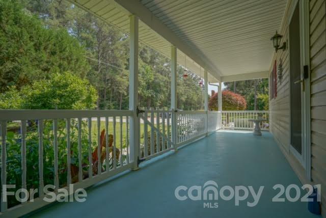 9675 Mt Olive Road Mount Pleasant, NC 28124 - Photo 5 of 48 a view of a balcony