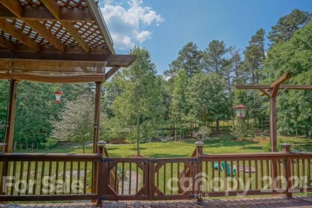 9675 Mt Olive Road Mount Pleasant, NC 28124 - Photo 43 of 48 a view of a wooden roof deck