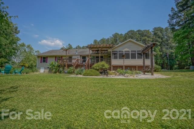 9675 Mt Olive Road Mount Pleasant, NC 28124 - Photo 48 of 48 a front view of a house with a garden