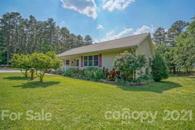 9675 Mt Olive Road Mount Pleasant, NC 28124 - Photo 6 of 48 a house view with a garden space