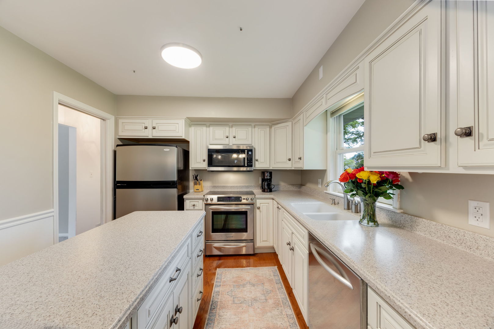 4N285 LaFox Road St. Charles, IL 60175 - Photo 5 of 17 a kitchen with microwave a stove and cabinets
