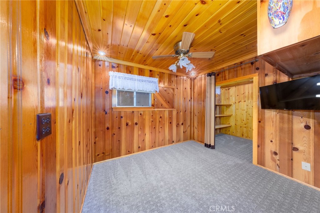 54805 South South Circle Idyllwild, CA 92549 - Photo 17 of 32 a view of a hallway with wooden walls