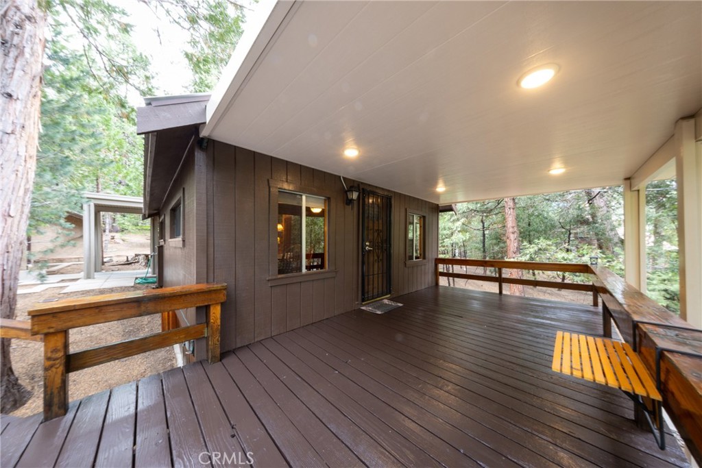 54805 South South Circle Idyllwild, CA 92549 - Photo 6 of 32 a view of empty room with wooden floor and windows