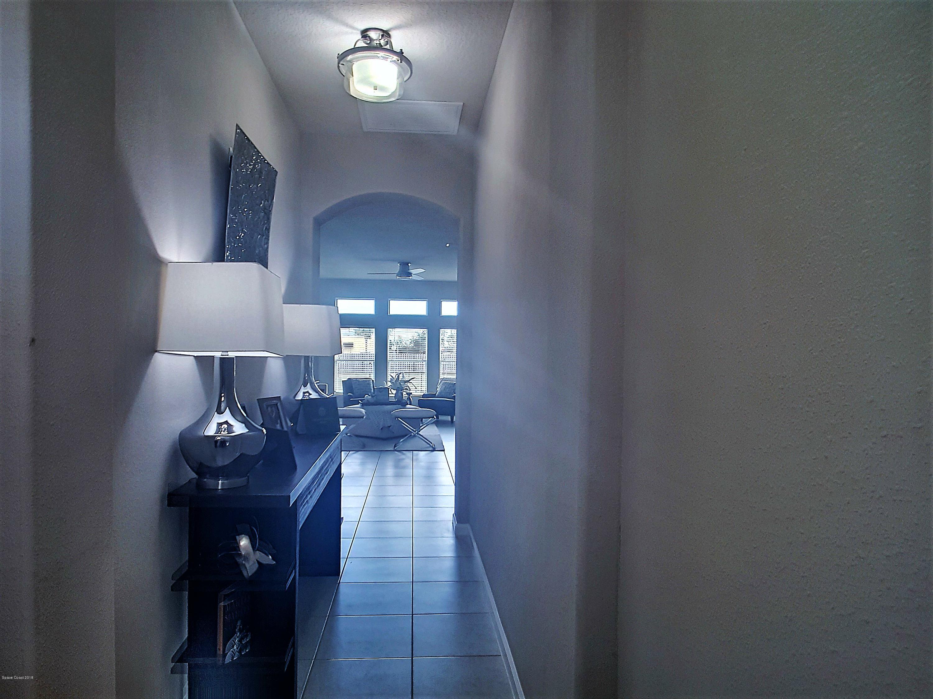 3575 Tabitha Court Melbourne, FL 32934 - Photo 5 of 13 Foyer hallway