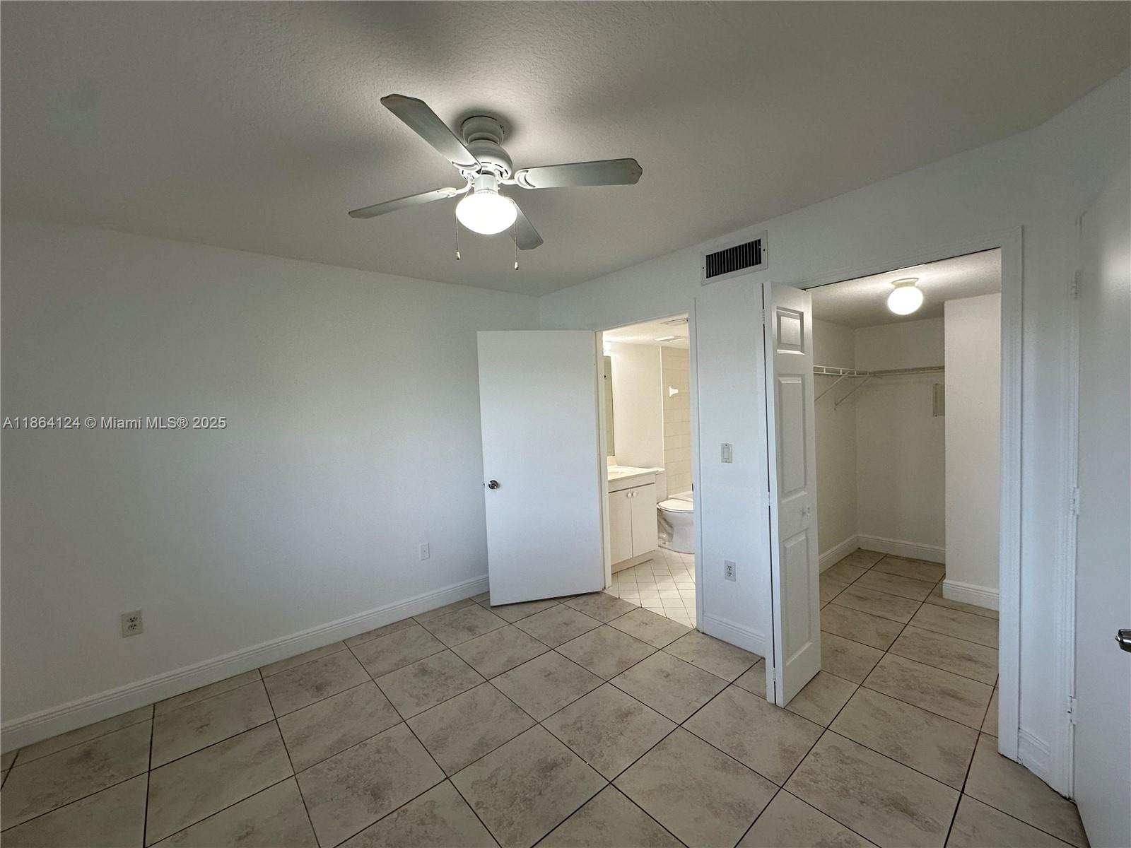 2910 Southeast 13th Avenue, Unit 10250 Homestead, FL 33035 - Photo 16 of 23 a view of a bathroom with a sink and a mirror