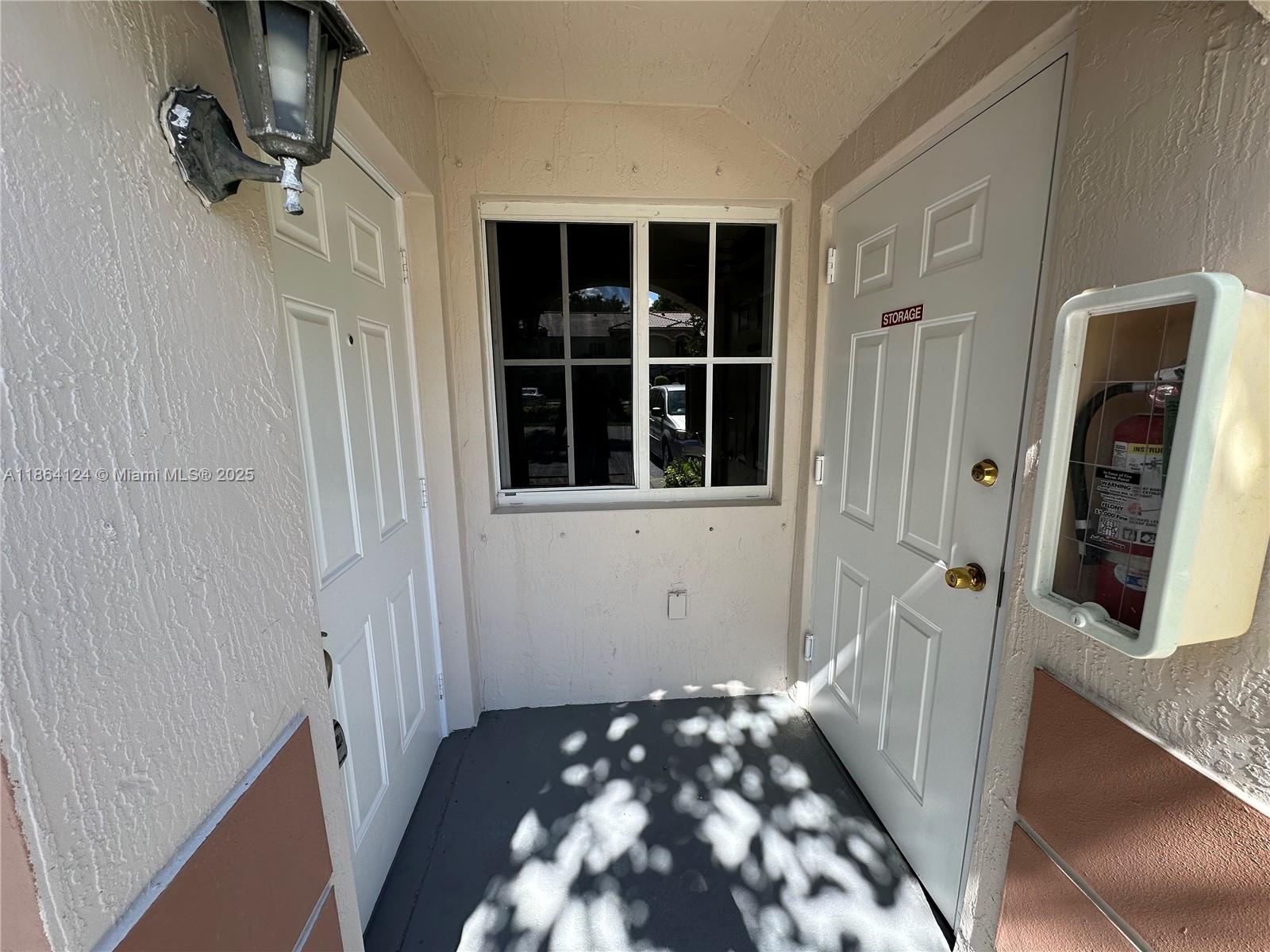 2910 Southeast 13th Avenue, Unit 10250 Homestead, FL 33035 - Photo 2 of 23 a view of front door