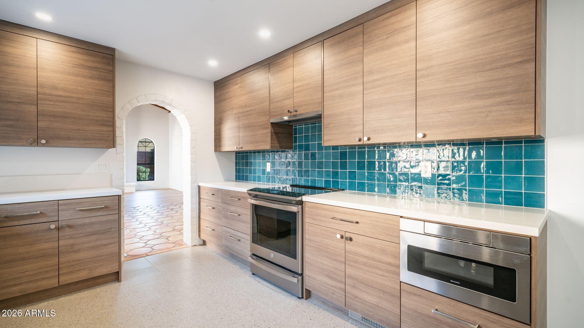 6833 North 18th Street Phoenix, AZ 85016 - Photo 15 of 38 Ample wood cabinets and counter space