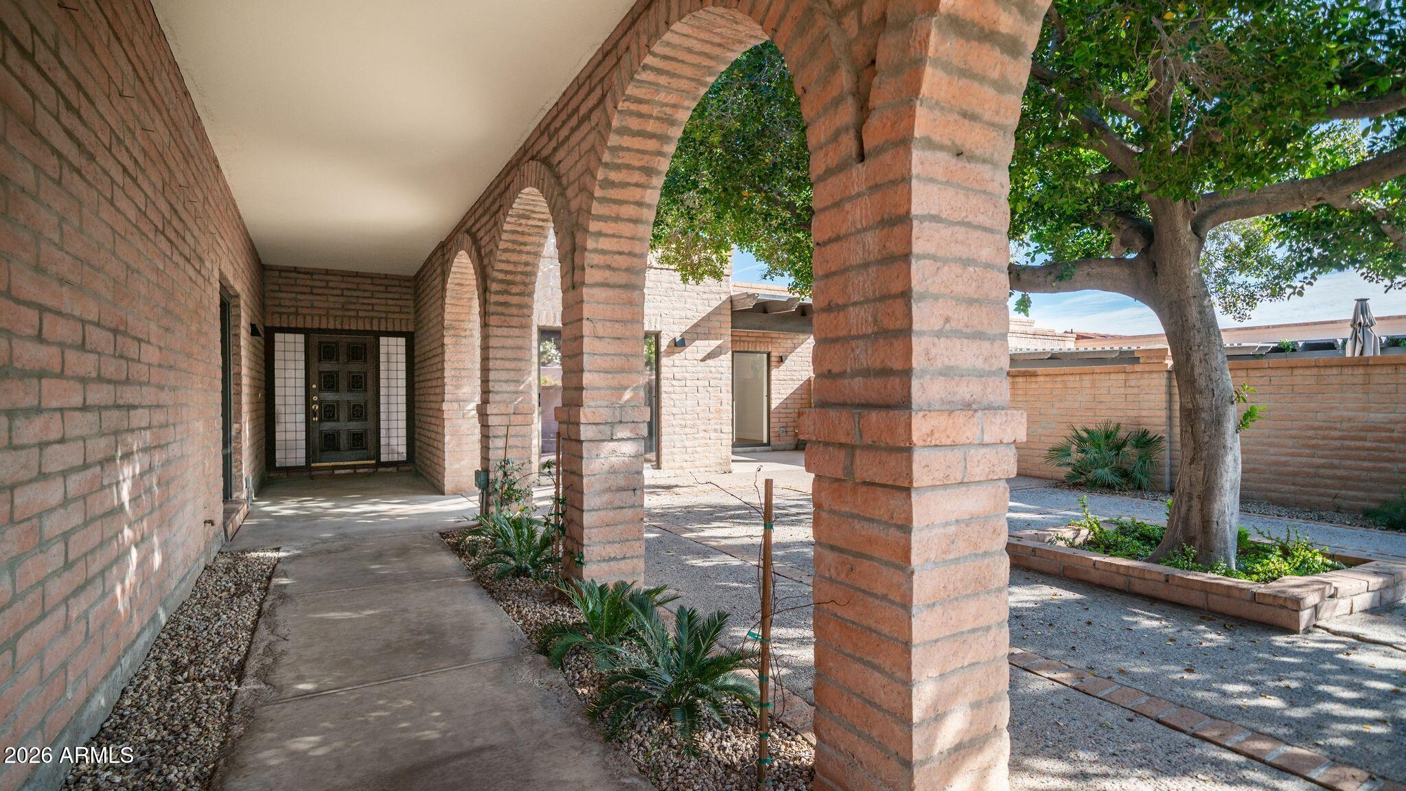 6833 North 18th Street Phoenix, AZ 85016 - Photo 3 of 38 Front Courtyard with mature plantings