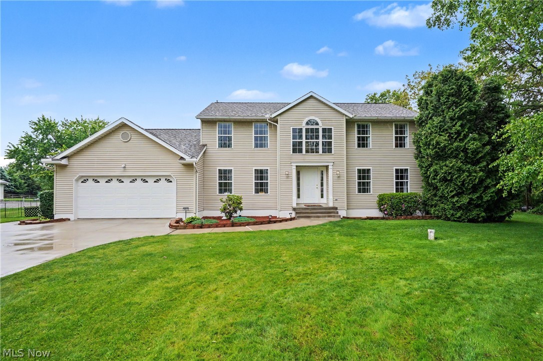 992 Martin Rd, Mogadore, OH 44260 offers the ideal blend of peaceful country living, functional space, and everyday comfort, all nestled on a beautiful tree lined setting on over 2 acres in Suffield Township of Portage County with easy access to Rt 224.