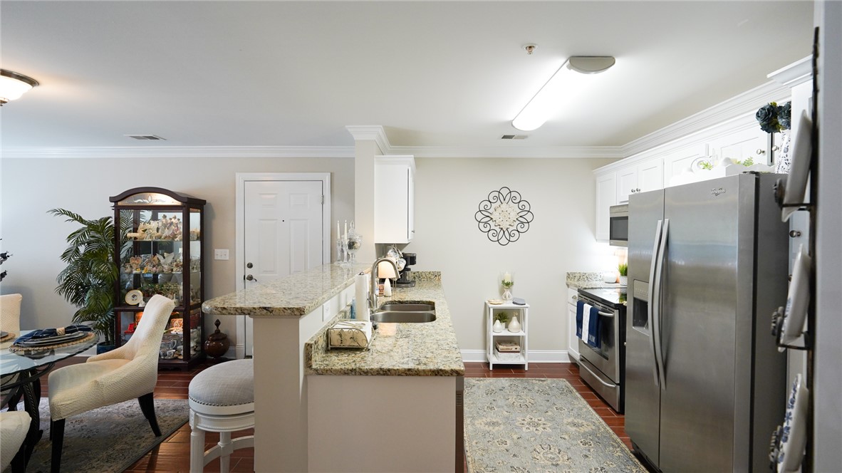 303 Lookover Drive Anderson, SC 29621 - Photo 13 of 46 This bright kitchen features ample counter space and modern appliances, perfect for everyday living.
