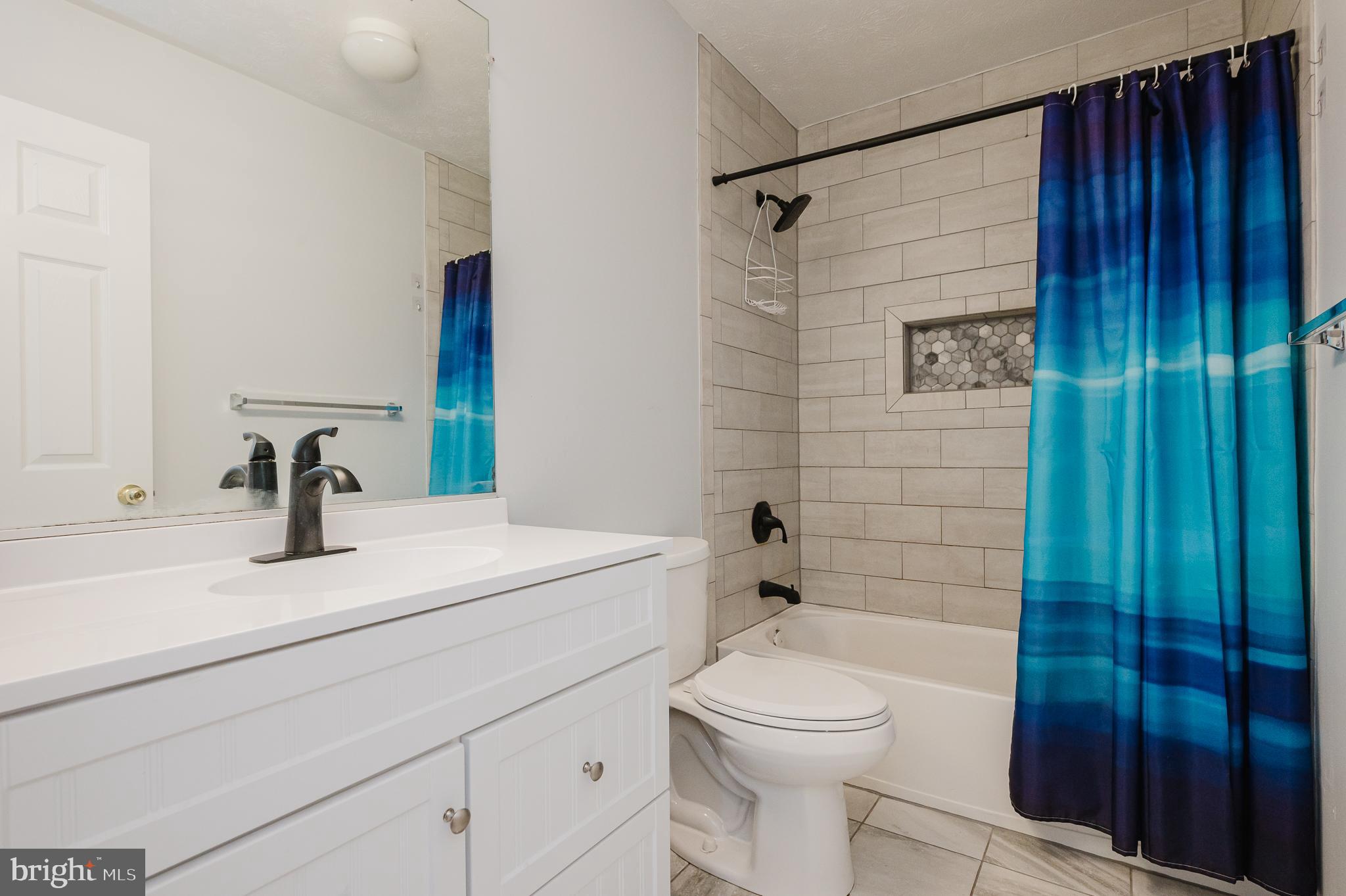 4614 Riddle Drive Nottingham, MD 21236 - Photo 35 of 54 Renovated Hall Bathroom
