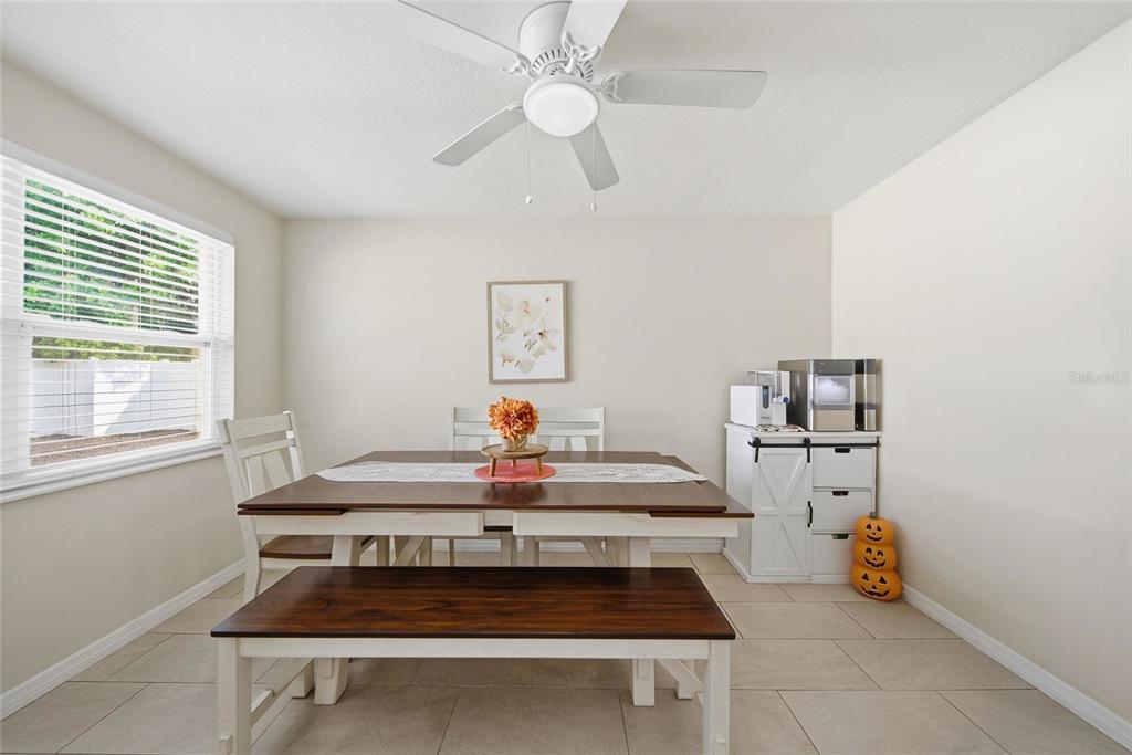 3744 Carron Street New Port Richey, FL 34652 - Photo 11 of 28 a living room with furniture and a table