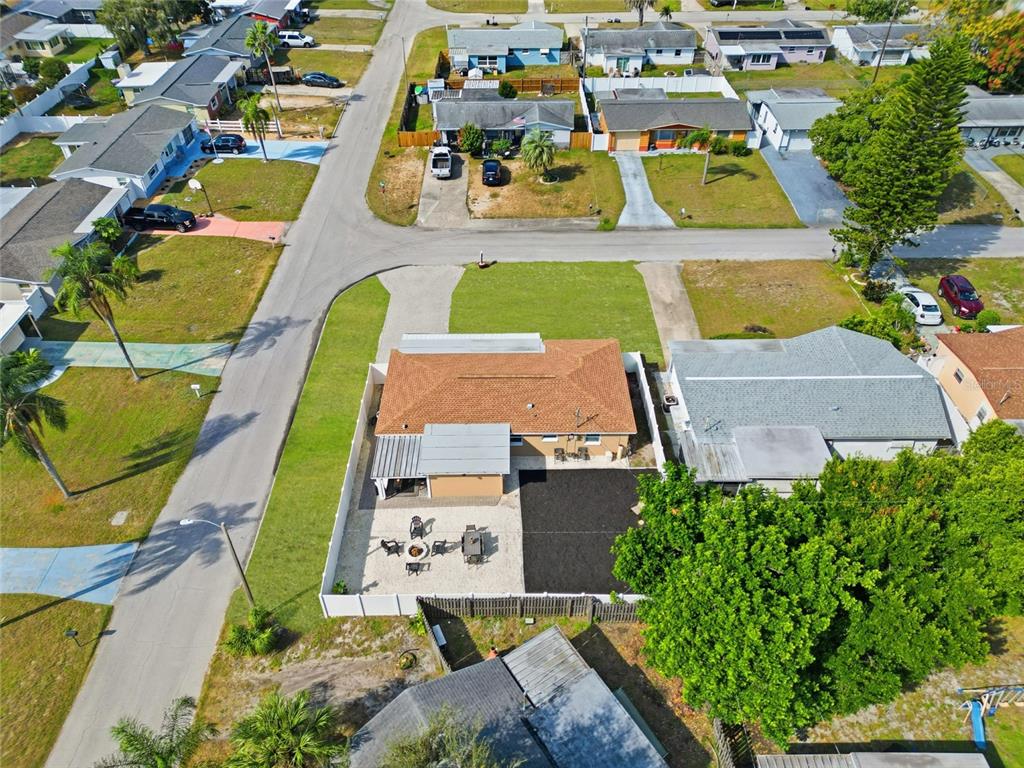 3744 Carron Street New Port Richey, FL 34652 - Photo 25 of 28 an aerial view of residential houses with outdoor space