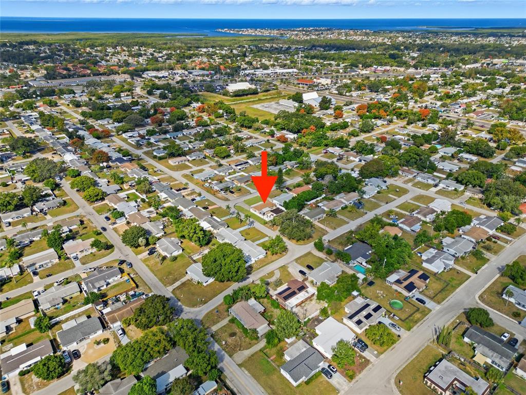 3744 Carron Street New Port Richey, FL 34652 - Photo 7 of 28 an aerial view of residential houses with outdoor space