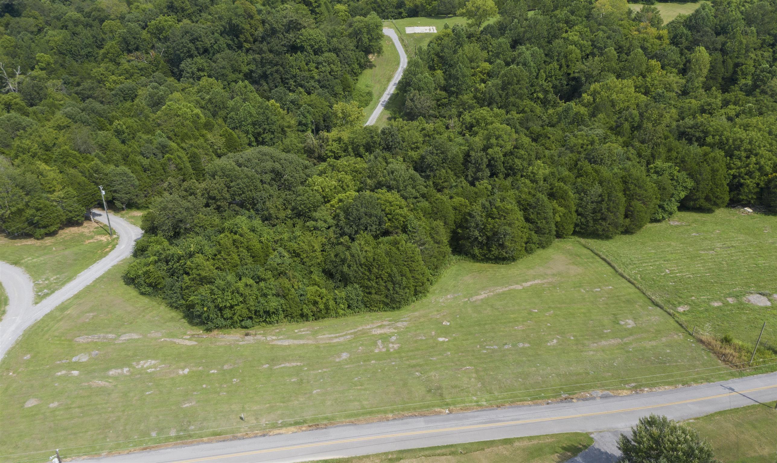 4449 Beasleys Bend Road Lebanon, TN 37087 - Photo 9 of 22 a view of a yard in a field