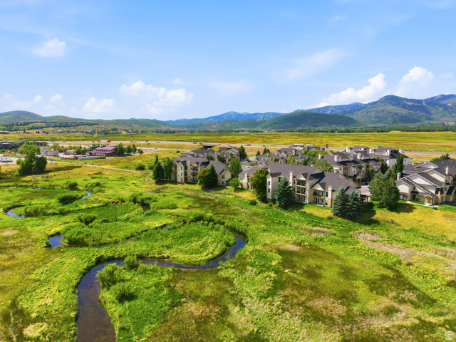 900 Bitner Road, Unit P17 Park City, UT 84098 - Photo 41 of 45 Community featuring multi-story residential buildings, a meandering natural waterway, and expansive green spaces